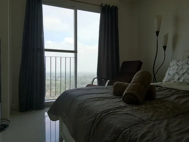 شقة سكنية بسرير كوين وسرير فردي بإطلالة على المدينة بغرفة نوم واحدة، Wind Residences by SMCo 1/4