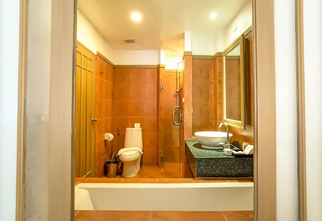 غرفة ديلوكس بسريرين كوين بإطلالة على الحديقة بغرفة نوم واحدة، The Sun Club Khao Lak by Katathani 2/2