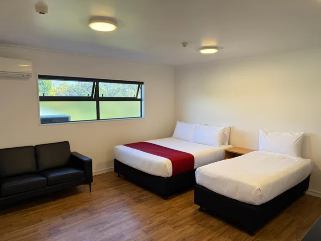 غرفة ديلوكس بسرير كوين، Uni Motel 1/5
