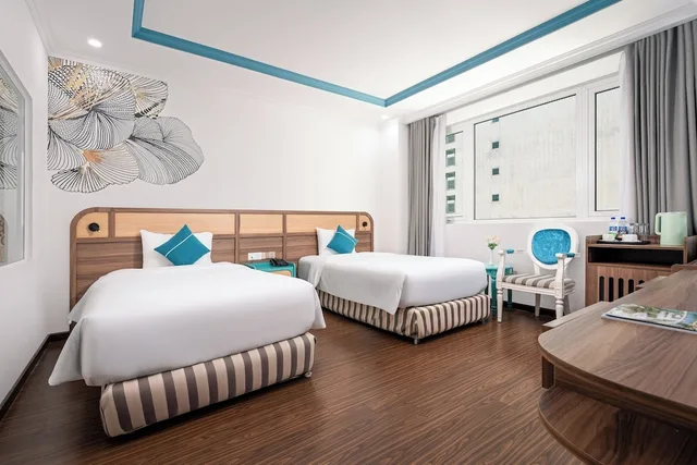 غرفة متصلة عائلية بأربعة أسرّة بإطلالة جزئية على البحر، PARACEL DANANG HOTEL 5/7