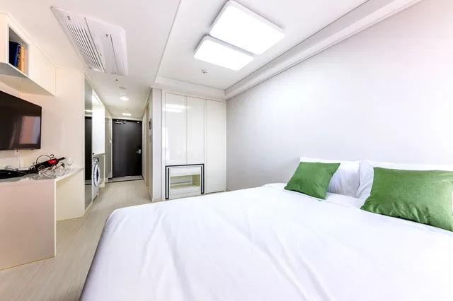 غرفة بريميير بسرير مزدوج بإطلالة على البحر، Shin Shin Hotel Seogwipo 1/3