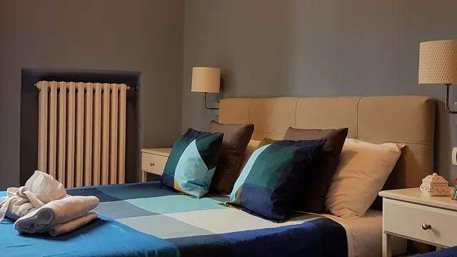 غرفة كومفورت بسرير كوين، Hotel Meuble Santa Chiara Suite 7/10