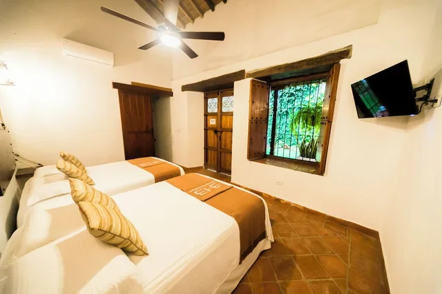 غرفة أساسية رباعية بسريرين مزدوجين، BOHEMIA HOTEL BOUTIQUE 1/3