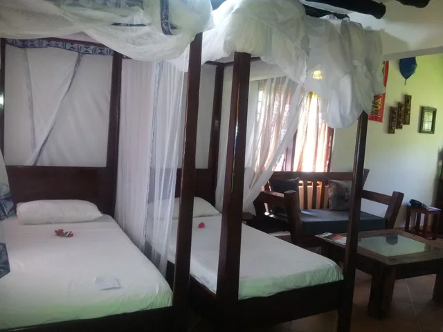 غرفة سوبيريور عائلية بسريرين منفصلين بإطلالة على البحر، Mnarani Beach Cottages 1/3