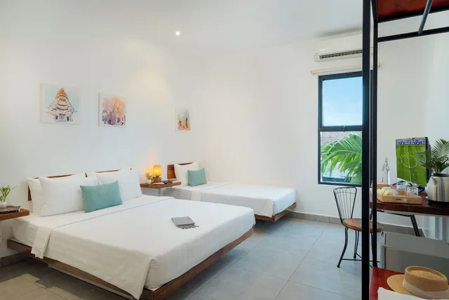 غرفة ديلوكس ثلاثية بسرير كوين وسرير فردي، Onederz Hostel Siem Reap 2/5