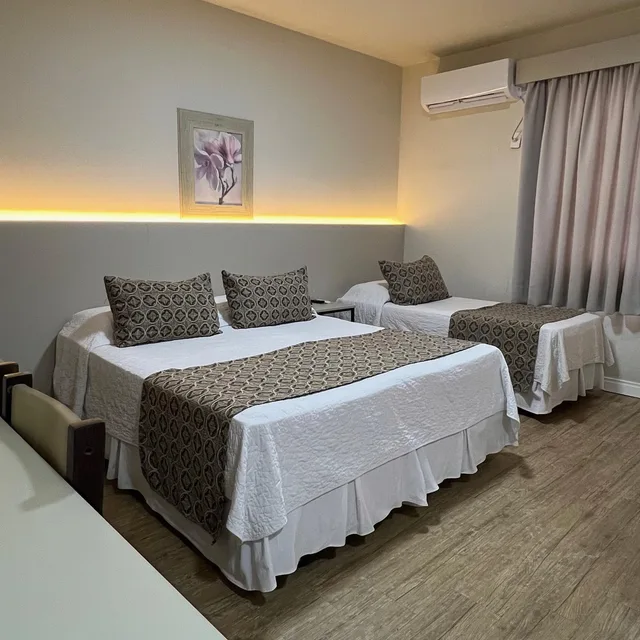 غرفة ثلاثية، Hotel Geranium 1/3