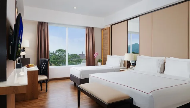 غرفة عائلية بسرير كوين وسرير فردي، Grand Sunshine Resort and Convention 2/6