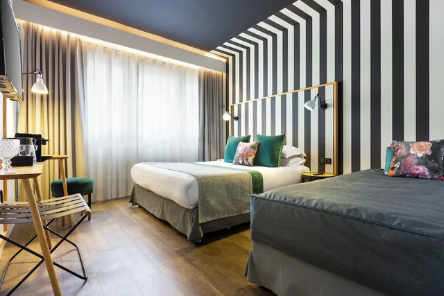 غرفة ثلاثية بسرير كوين وسرير فردي، Hotel Edmond W 2/4