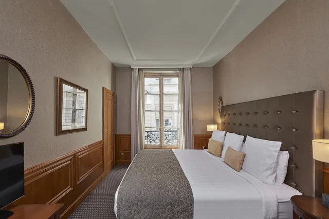 جناح جونيور بسريرين منفصلين مع أريكة، Melia Paris Vendome 2/4