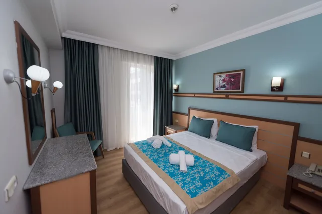 غرفة عائلية بسرير كوين وسريرين منفصلين، Side Village Hotel 3/9