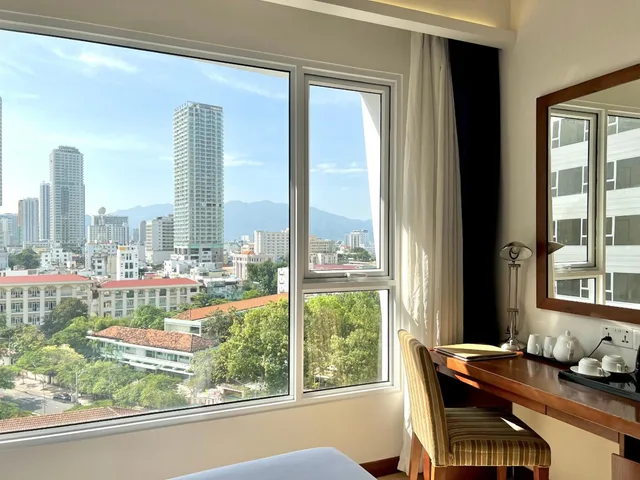 غرفة ثلاثية بسرير كوين وسرير فردي بإطلالة على المدينة، TTC Hotel - Michelia 7/7