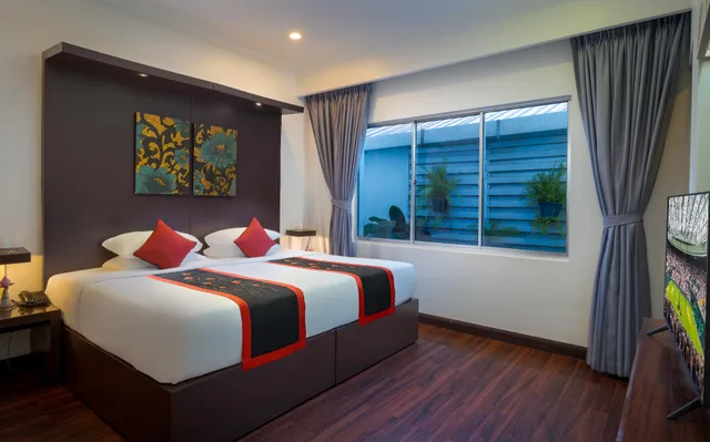 جناح عائلي بسرير مزدوج وسرير فردي مع أريكة، Memoire D Angkor Boutique Hotel 1/2
