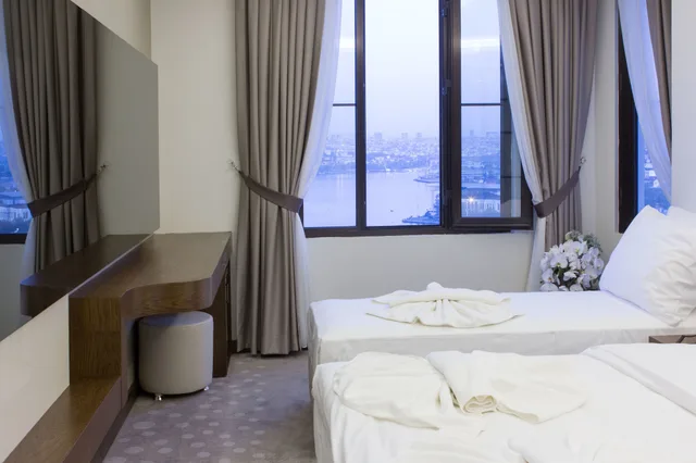 غرفة ديلوكس ثلاثية بسرير مزدوج وسرير فردي بإطلالة على البحر، The Biancho Hotel Pera 8/10