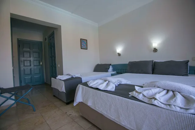 غرفة قياسية ثلاثية بسرير كوين وسرير فردي، Kilim Hotel 1/10