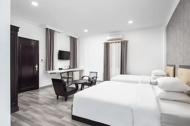 غرفة ديلوكس ثلاثية بسرير كوين وسرير فردي، KING GRAND BOUTIQUE HOTEL 4/9