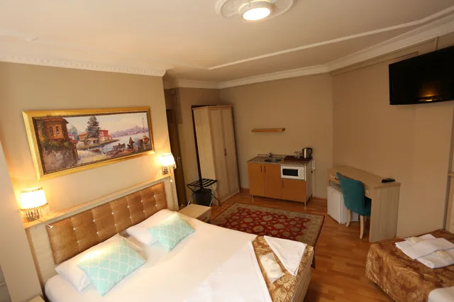 جناح عائلي بأربعة أسرّة وسريرين مزدوجين بـ3 غرف نوم، Tashkonak Hotel 3/7
