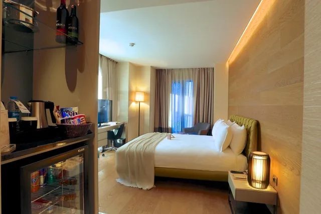 غرفة تنفيذية بسرير كوين، Dosso Dossi Hotels and SPA Downtown 5/7