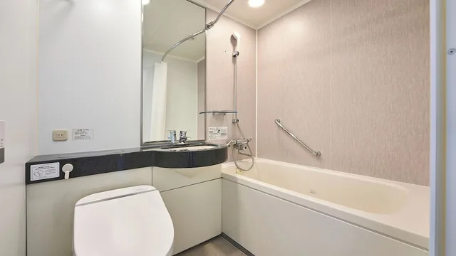 غرفة ديلوكس ثلاثية بسريرين مزدوجين مع سرير سحّاب إضافي للمدخنين، Daiwa Roynet Hotel 2/2