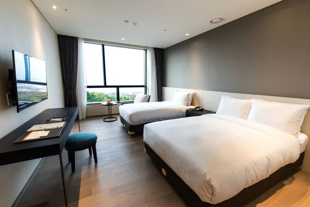 غرفة ديلوكس بسرير مزدوج وسرير فردي، Hotel Nanta 3/8