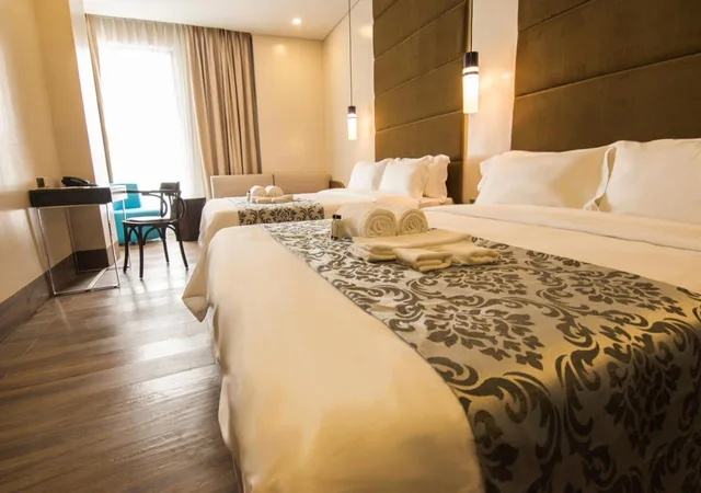 غرفة ديلوكس بسرير مزدوج، Goldberry Lite Hotel Iloilo 1/3