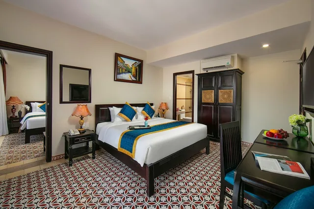 جناح متصل بسرير كينج وسرير كوين بشرفة، Hoi An River green Boutique Hotel 2/6