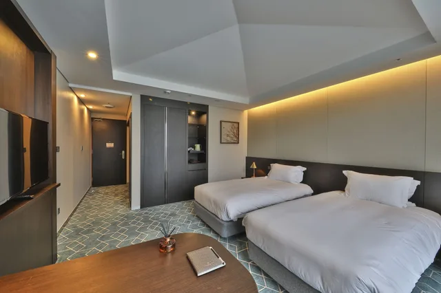 غرفة بسريرين منفصلين، Camphortree Hotel And Resort 3/8
