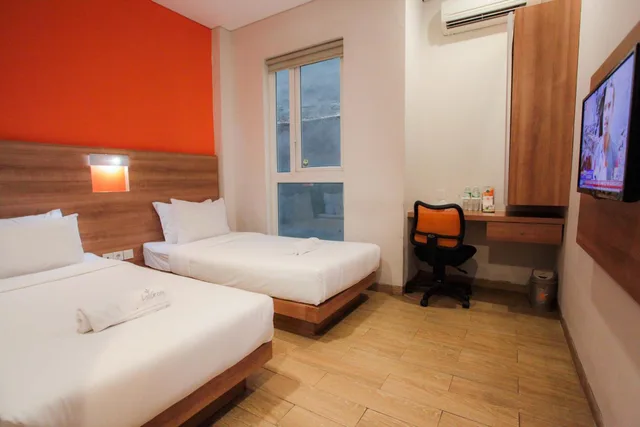 غرفة اقتصادية بسريرين منفصلين، LeGreen Suite Kuningan 1/3