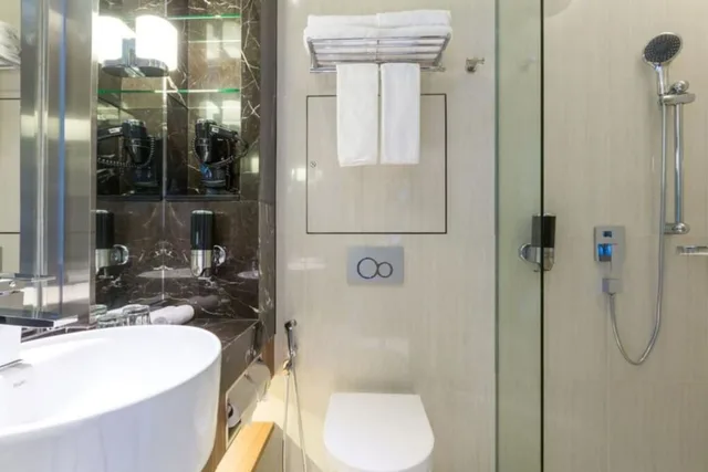غرفة قياسية بسرير كوين بإطلالة على الجبل في الطابق العلوي، Holiday Inn Express Singapore Clarke Quay 9/9
