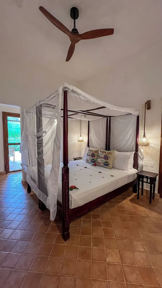 غرفة قياسية بسرير كينج بإطلالة على الحديقة، Mvuvi Boutique Resort 3/9