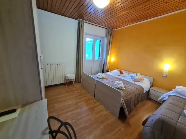 غرفة كومفورت ثلاثية بسرير كوين وسرير فردي، Hotel Excelsior Cimone 4/8