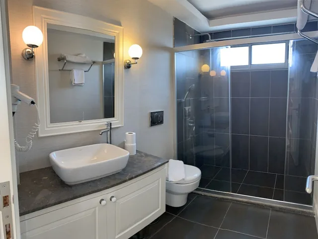 غرفة اقتصادية بسرير كوين مع أريكة، Daphne Residence 6/10