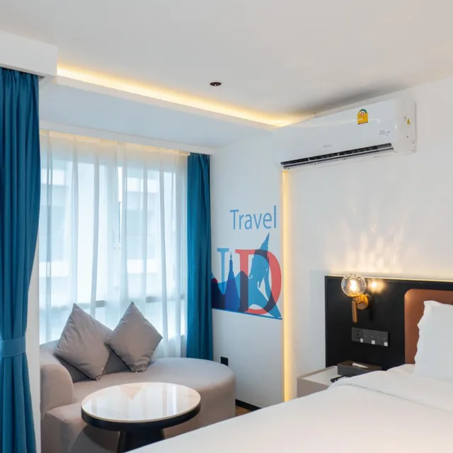 غرفة قياسية بسرير كينج وسرير كوين، Juzi Hotel 1/2