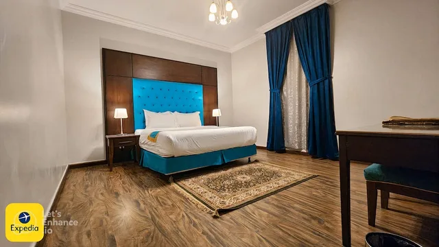 شقة ديلوكس بسرير كينج وثلاثة أسرّة بغرفتي نوم، لازورد بالاس للشقق الفندقية(Lazourd Palace Hotel Apartments) 1/4