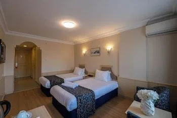 غرفة قياسية بسرير كينج وسريرين منفصلين، Berr Hotel 1/1