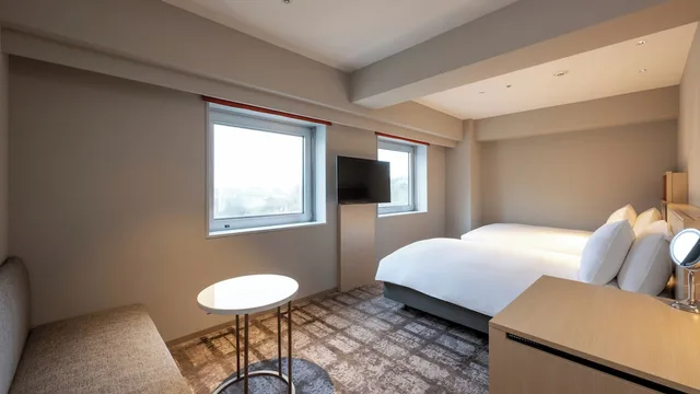 غرفة بريميوم ركنية بسريرين منفصلين مع دخول صالة النادي، ANA Crowne Plaza Akita by IHG 1/4