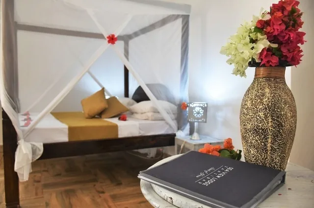 Family, 1 Single and 2 Queen Beds, Pool View, Patio، Sea View Lodge Boutique Hotel 2/4
