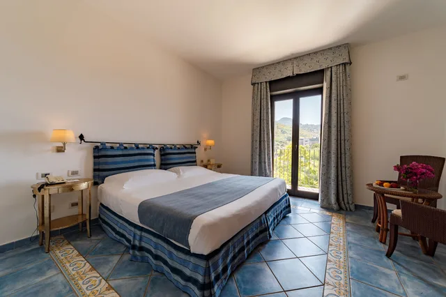 غرفة ديلوكس ثلاثية بسرير كينج، Alberi del Paradiso Hotel 4/10