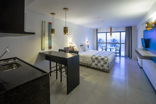 Life, Deluxe, Triple, 1 Double and 1 Single Bed, Kitchen، Ritz Suites Grand Hotel Boutique 3/8