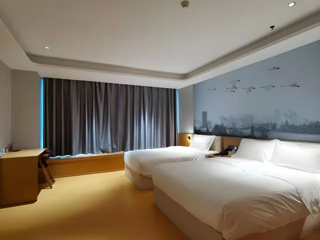 غرفة بزنس عائلية، GreenTree Inn North WeiHai Station North International Bathing Beach Hotel 1/2