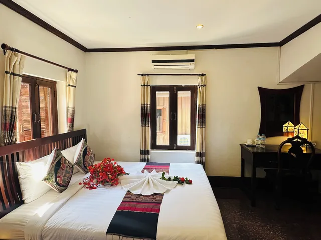 غرفة ديلوكس ثلاثية بسرير كينج وسرير فردي، Thatsaphone Hotel 4/9