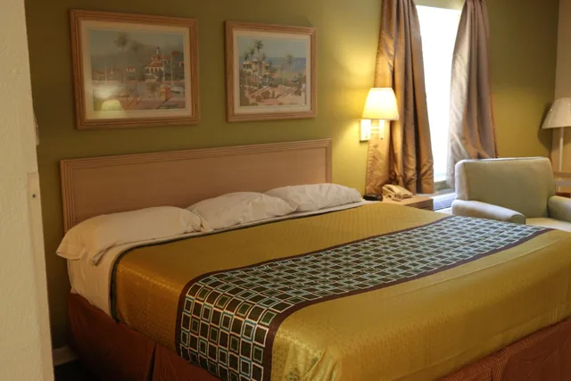 غرفة ديلوكس مفردة، Woodstream Inn 1/3