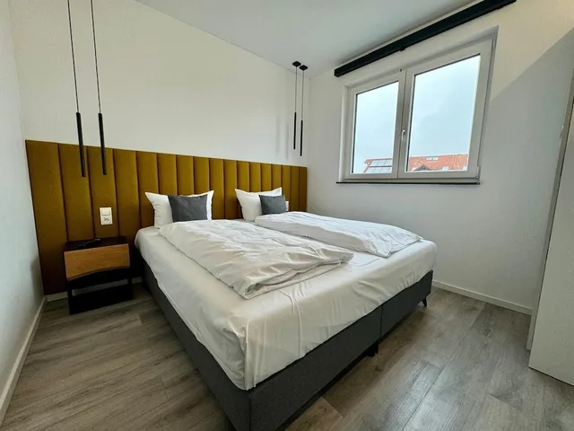 جناح جونيور بسرير كينج وسرير بطابقين بشرفة مع أريكة، Hotel Andante Rust 1/2
