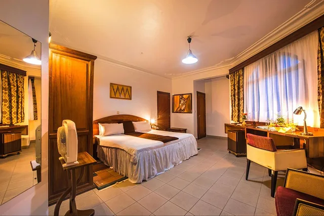 غرفة كومفورت مفردة بسرير كينج، Chez Lando Hotel 2/7