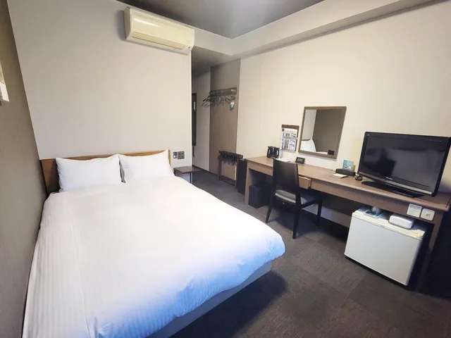 غرفة بسرير مزدوج في المبنى الرئيسي للمدخنين، Hotel Route-Inn Court Komoro 1/4