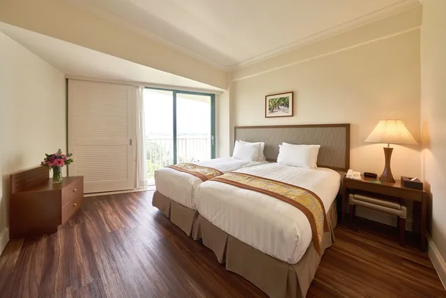 غرفة بريميير بسريرين منفصلين بإطلالة جزئية على البحر بمطبخ صغير، Lotte Hotel Guam 3/4