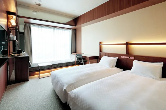 غرفة بسريرين منفصلين مع دخول الصالة في طابق مرتفع، Candeo Hotel Utsunomiya 1/3