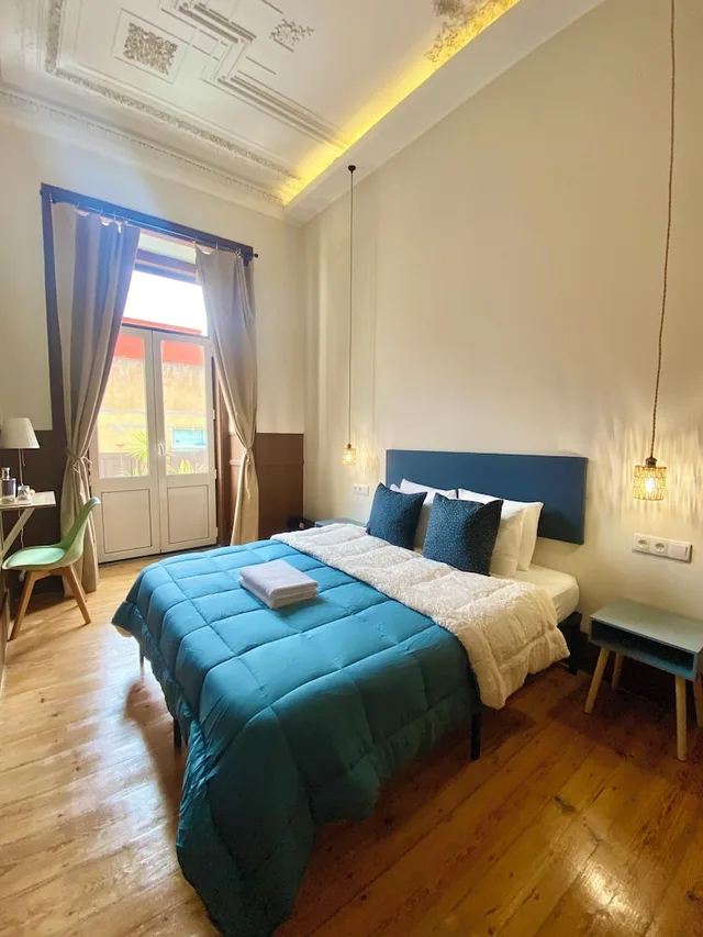 غرفة كومفورت بسرير مزدوج بإطلالة على الفناء بشرفة بحمام مشترك، Ambiente Hostel 5/9