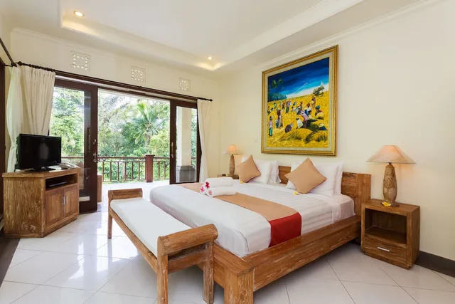 غرفة ديلوكس بسرير مزدوج بإطلالة على الحديقة، Puri Payogan Villa 3/5