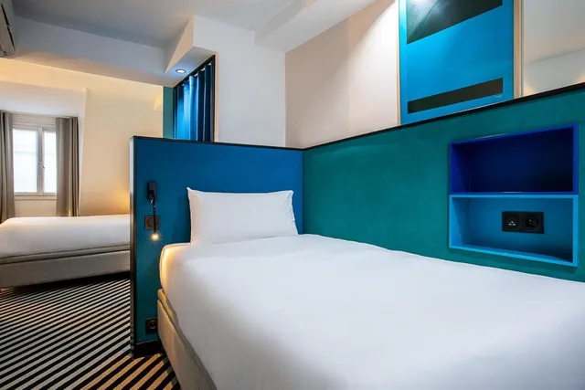 غرفة ثلاثية بسرير مزدوج وسرير فردي، Hotel Pilime Formerly Hotel Aurore Montmartre 1/2