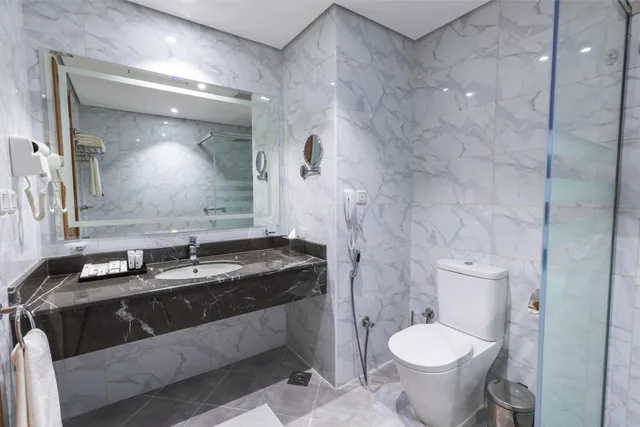 غرفة ديلوكس رباعية بأربعة أسرّة، فندق وأجنحة تايم ربا(TIME Ruba Hotel & Suites) 5/10